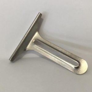 Guía en forma de "T"